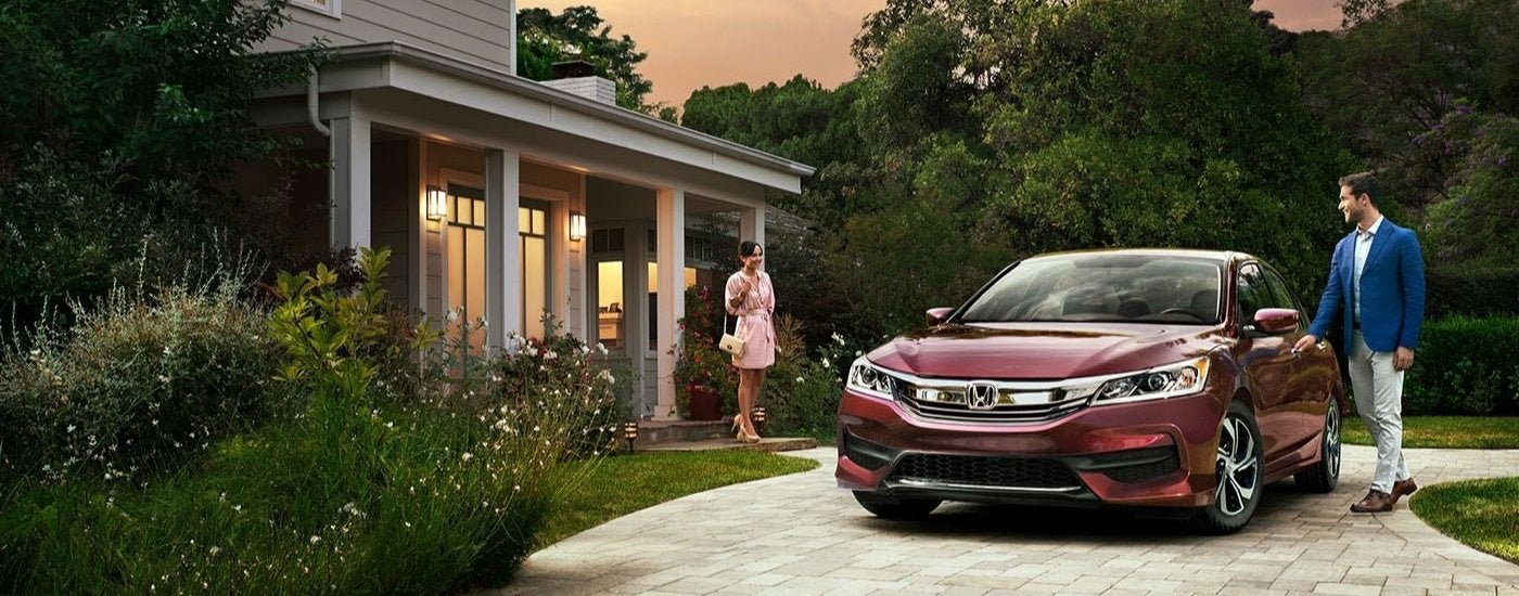 Red 2017 Honda Accord LX parked on a driveway.