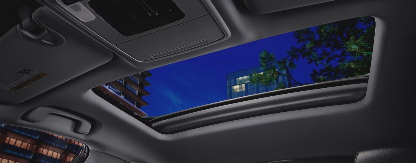 Interior view of the one touch moonroof in a 2026 Honda Accord.