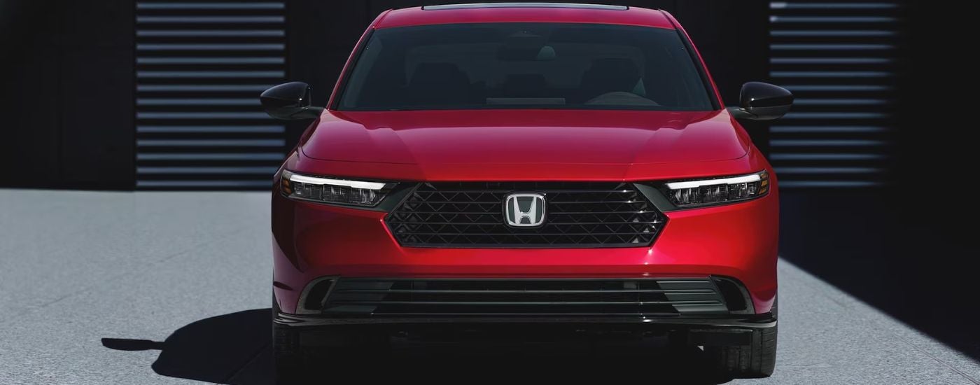 Red 2026 Honda Accord close up, front view.